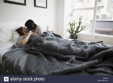 people kissing in the bed|Passionate Couple In Bed stock videos and footage.